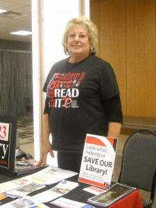 Deborah DiGennaro staffs Toledo-Lucas County Library Information Table at “Candidates’ Forum 2012”